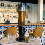 This Image Shows A Booze Tower's Beer Tower Sitting On A Table. Australia's number 1 provider of certified beer towers and cocktail towers.