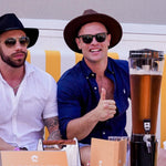 This images shows to men with a Booze Towers beer tower. Australia's number 1 provider of certified beer towers and cocktail towers.