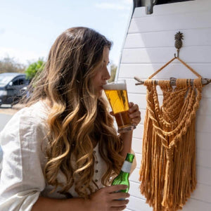 
                  
                    This image shows a lady who has just poured a bottler of beer into a Polycarbonate Pilsner Glass 430ml. These glasses look great next to a booze towers beer tower
                  
                